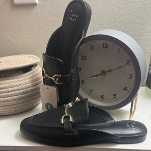 A New Day Black Mules with Gold Detail